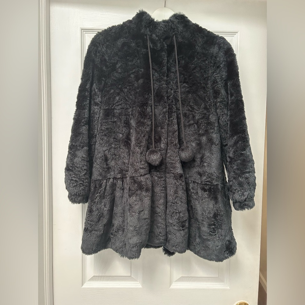 Faux fur black coat.